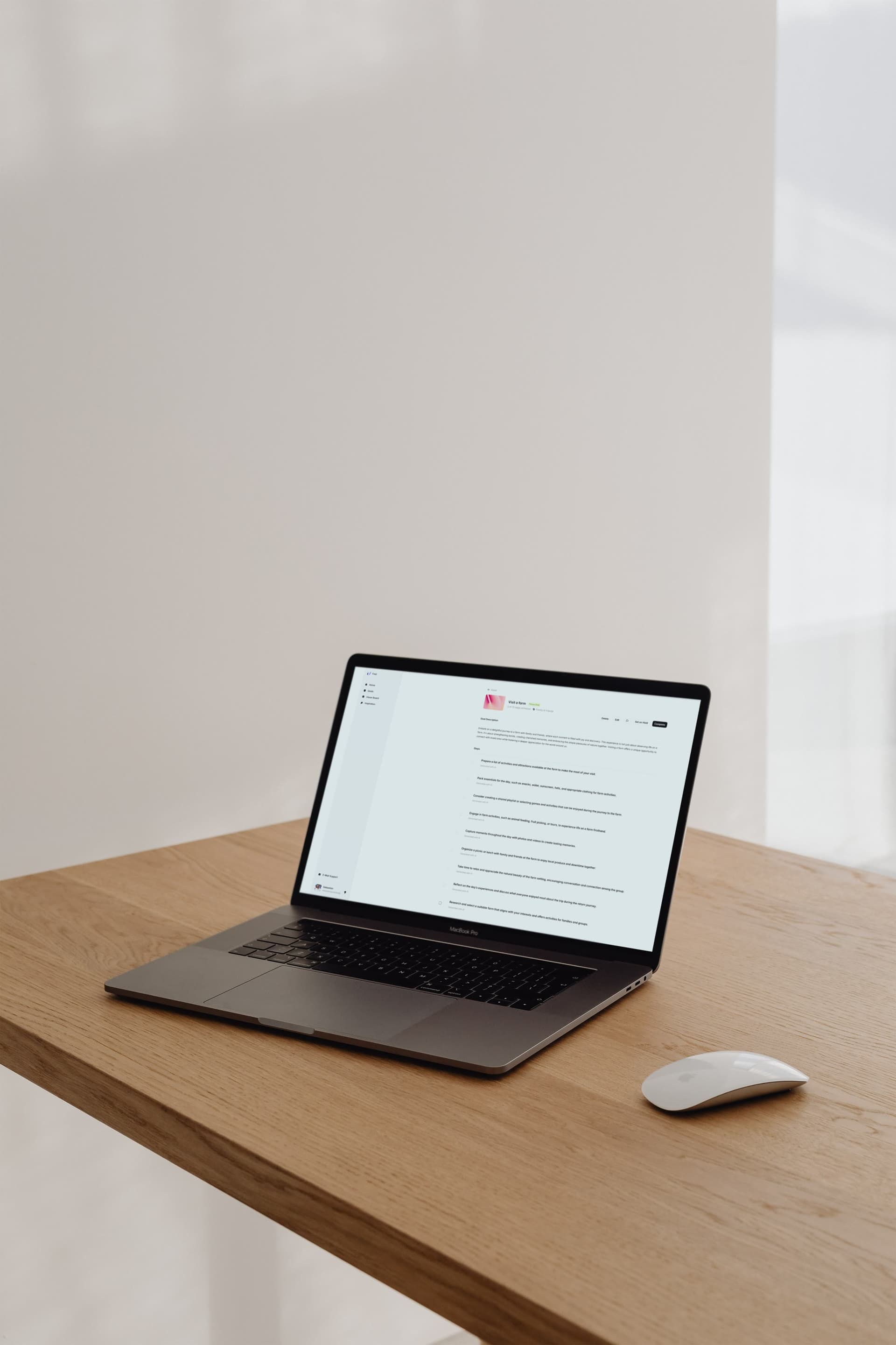 Fred goal detail with AI-generated steps on a MacBook.